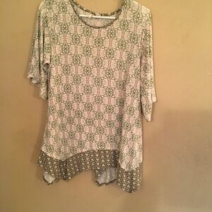 Very cute and perky high low blouse.